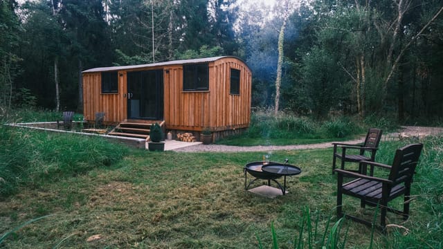 Hut with fire pit and chairs