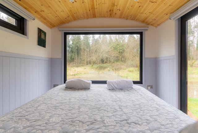 Bedroom with a view of the pond