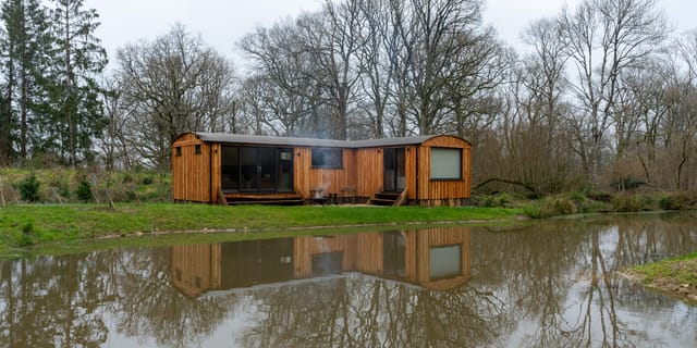 Lodge reflected in the pond