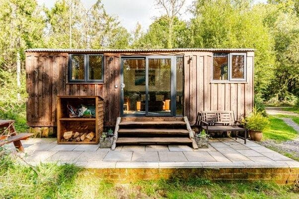 Hut exterior with woodstack