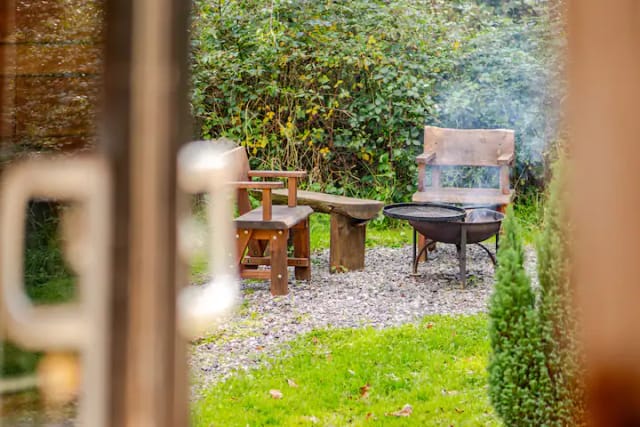 Looking out from the hut to the fire pit